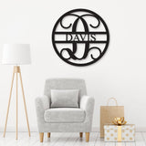 Wooden circle monogram sign with last name in living room